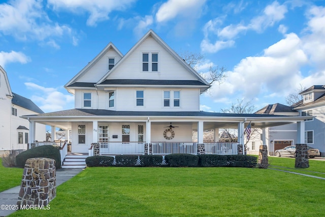 farmhouse inspired home with a front lawn and a porch