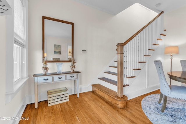 stairs with wood-type flooring