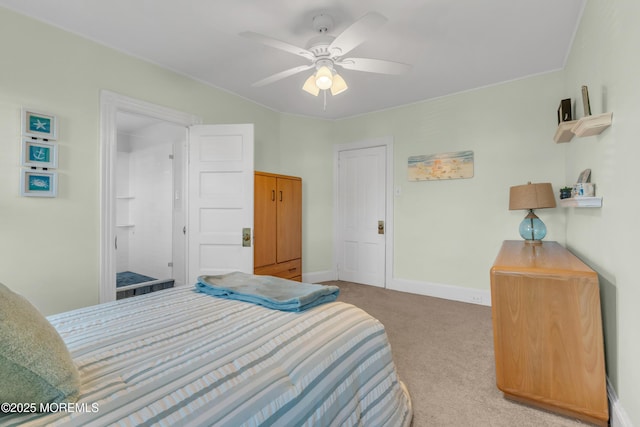 bedroom featuring light carpet and ceiling fan