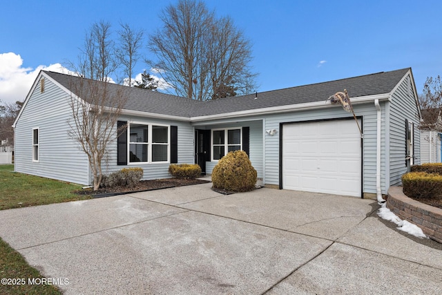 single story home with a garage