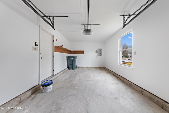 garage featuring electric panel and a garage door opener