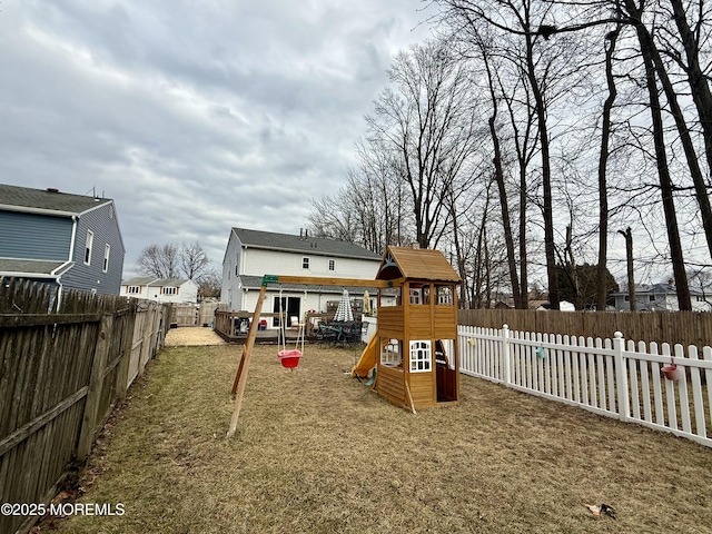 view of play area featuring a lawn