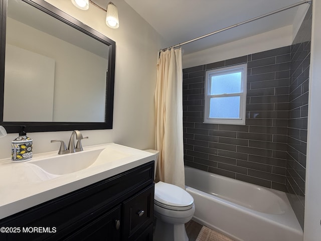 full bathroom with vanity, toilet, and shower / tub combo