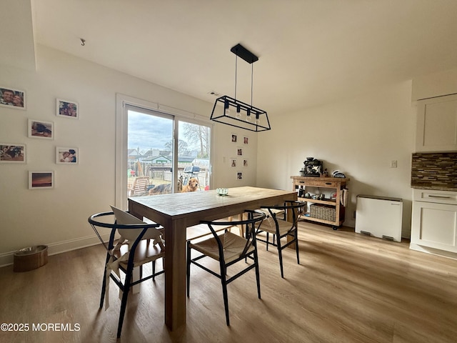 dining room featuring light hardwood / wood-style floors