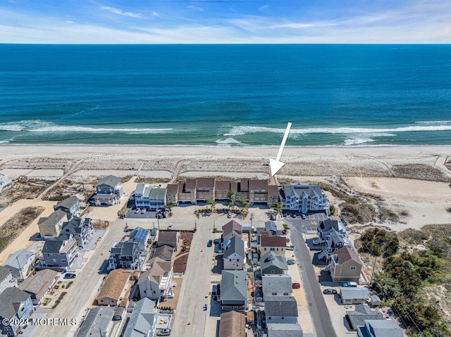 aerial view featuring a beach view and a water view