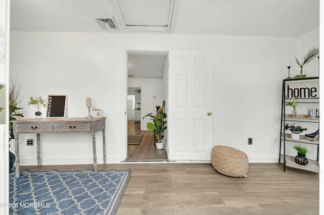 interior space with hardwood / wood-style floors