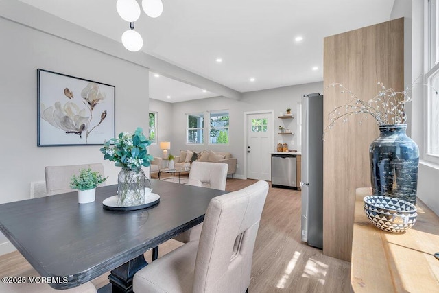 dining room with light hardwood / wood-style flooring