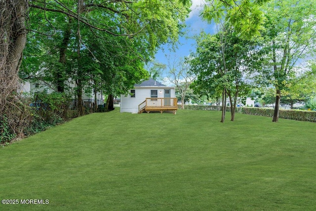 view of yard featuring a deck