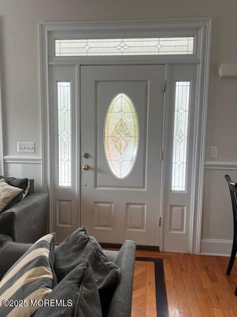 entryway with light hardwood / wood-style floors