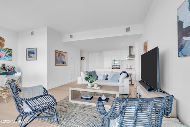 living room featuring light hardwood / wood-style floors