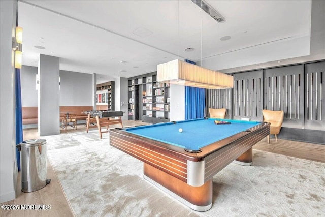 playroom featuring light colored carpet and billiards