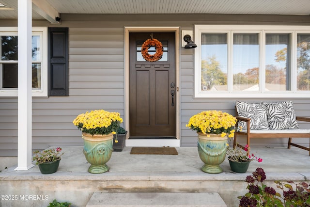 property entrance with a porch