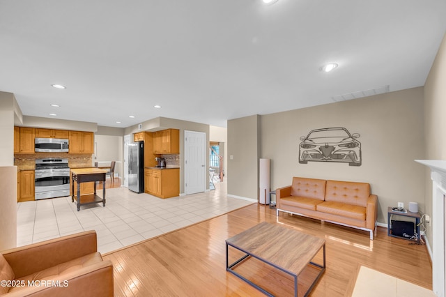 living room with light tile patterned floors