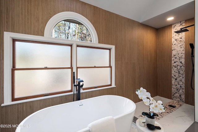 bathroom featuring lofted ceiling and shower with separate bathtub