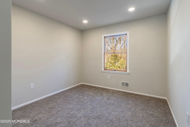 view of carpeted spare room