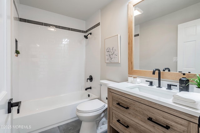 full bathroom featuring toilet, tile patterned floors, bathing tub / shower combination, and vanity