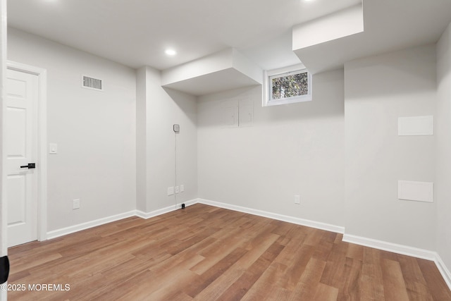 basement with light wood-type flooring