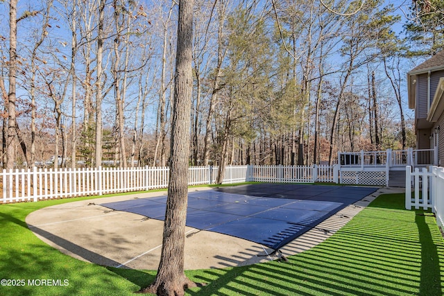 view of pool featuring a patio area