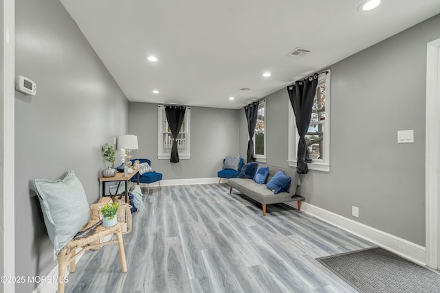 sitting room with light wood-type flooring