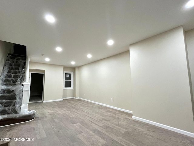 basement with wood-type flooring