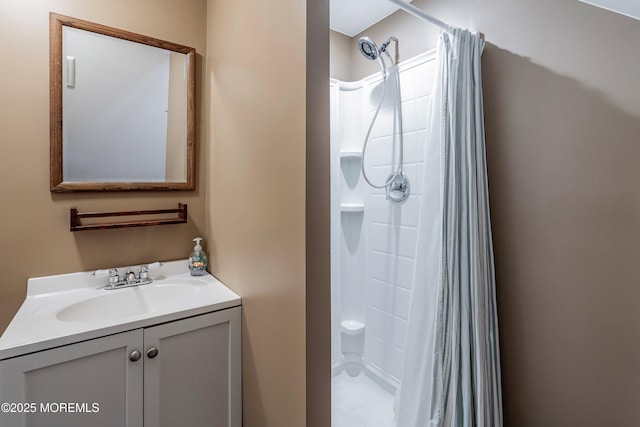 bathroom featuring vanity and walk in shower