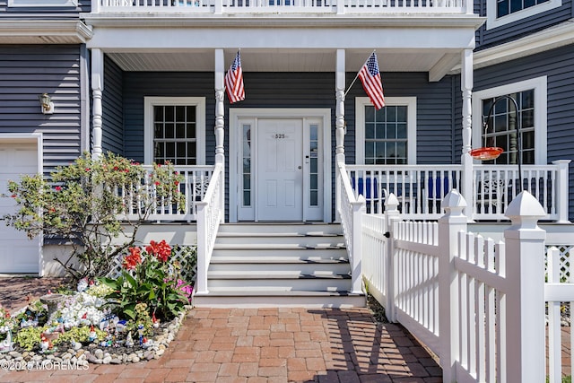 property entrance featuring covered porch