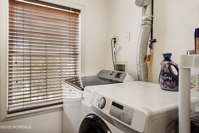 washroom with washer and clothes dryer