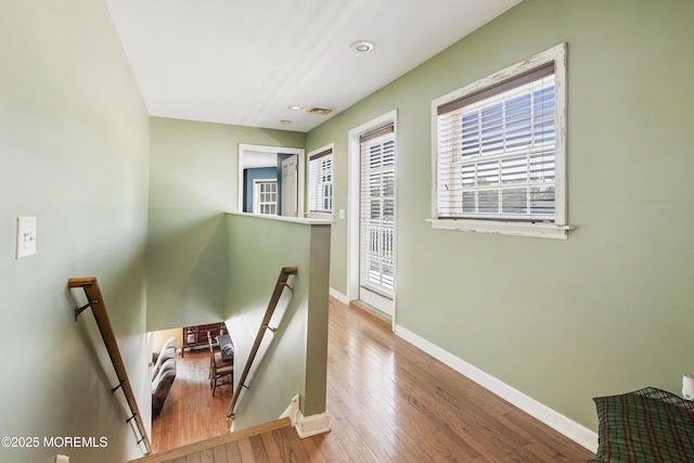 stairway with wood-type flooring