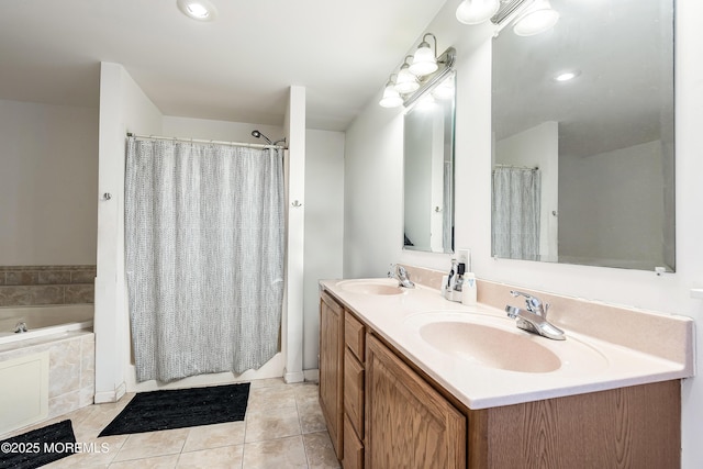 bathroom with tile patterned flooring, vanity, and plus walk in shower