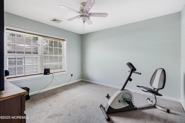 workout room featuring carpet and ceiling fan