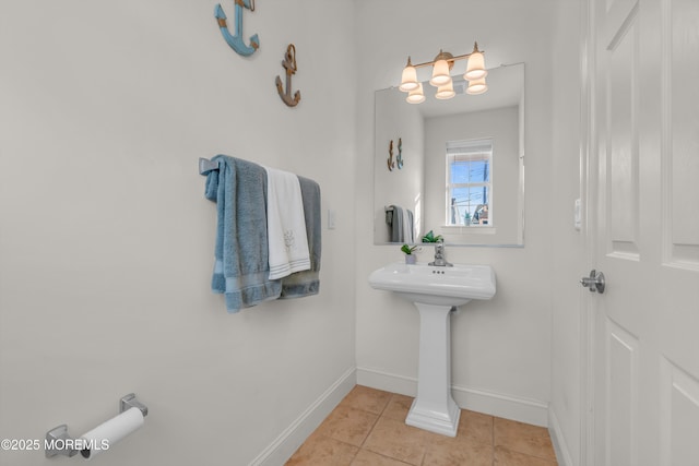 bathroom with tile patterned floors