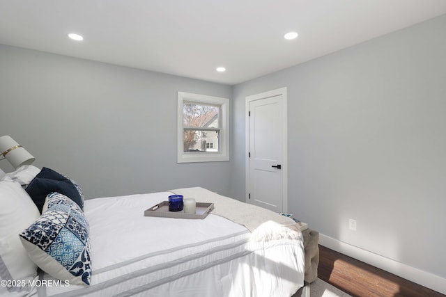 bedroom featuring hardwood / wood-style flooring