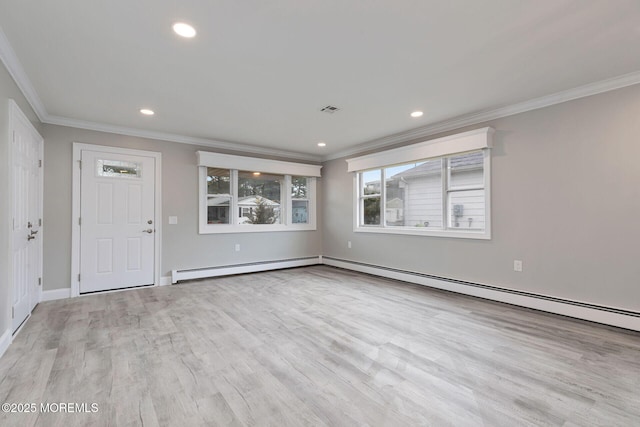 interior space with baseboard heating, light wood-type flooring, and crown molding