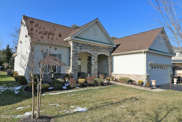 ranch-style home with a front lawn and a garage