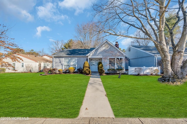 view of front of property with a front lawn