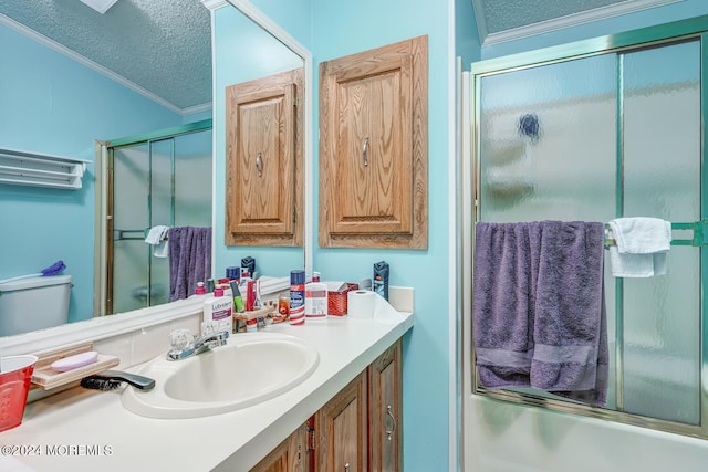 full bathroom with vanity, crown molding, shower / bath combination with glass door, and a textured ceiling