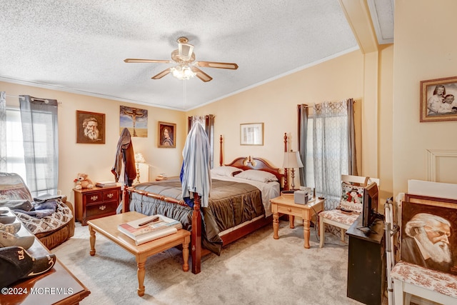 carpeted bedroom featuring ornamental molding, a textured ceiling, ceiling fan, and lofted ceiling