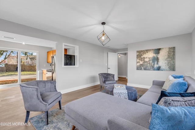 living room with light wood-type flooring