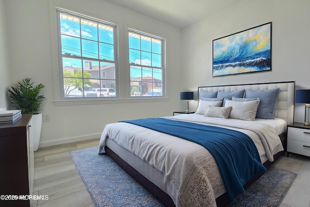 bedroom with light hardwood / wood-style floors