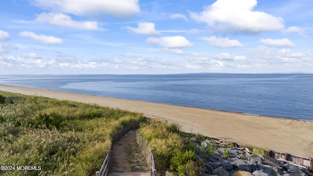 property view of water with a beach view