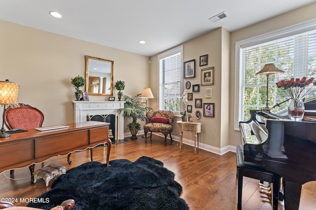 office area with hardwood / wood-style floors