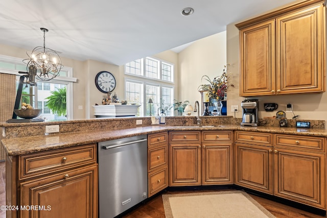 kitchen with dark hardwood / wood-style flooring, sink, dishwasher, and a notable chandelier