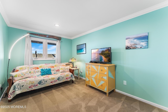 carpeted bedroom featuring crown molding