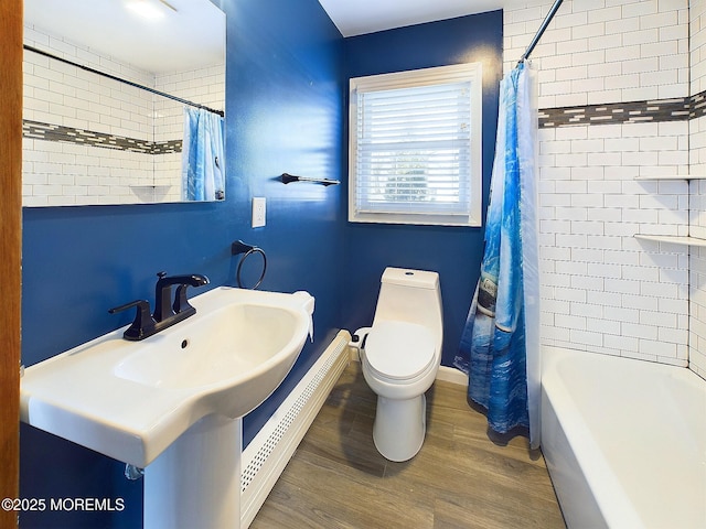 bathroom featuring toilet, shower / tub combo, and hardwood / wood-style flooring