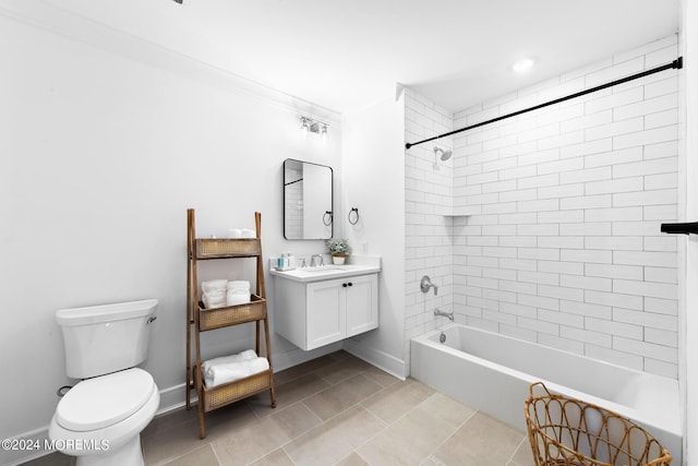 full bathroom featuring toilet, tiled shower / bath combo, tile patterned floors, and vanity