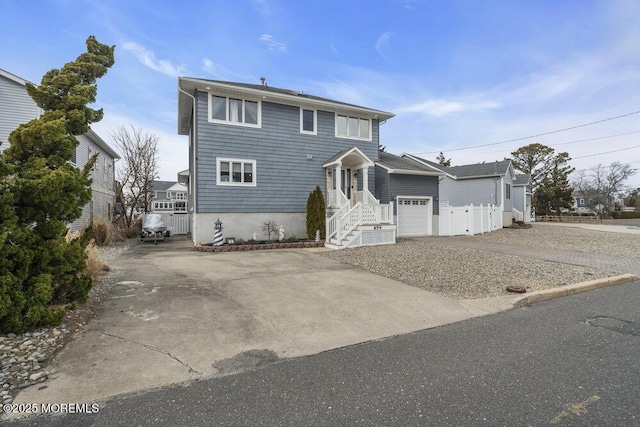 front of property with a garage