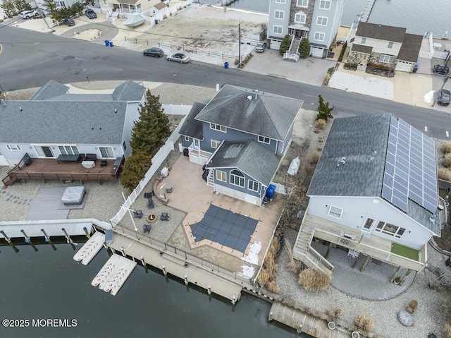 bird's eye view with a water view