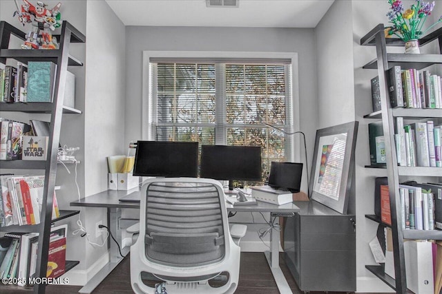 office space with dark hardwood / wood-style floors