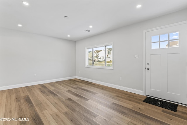 foyer with light hardwood / wood-style flooring