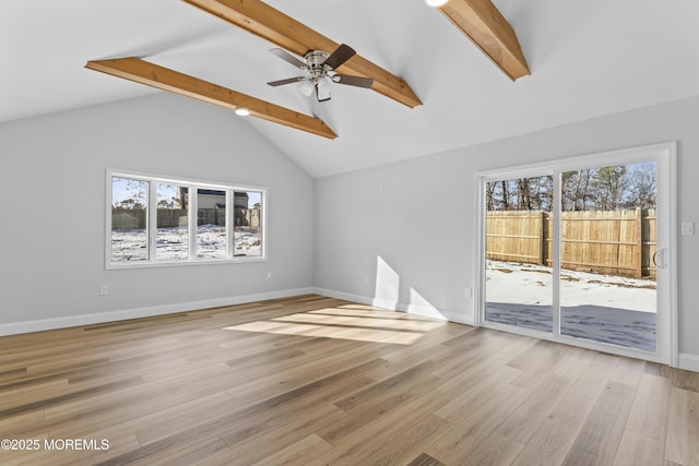 unfurnished living room featuring ceiling fan, vaulted ceiling with beams, and light wood-type flooring